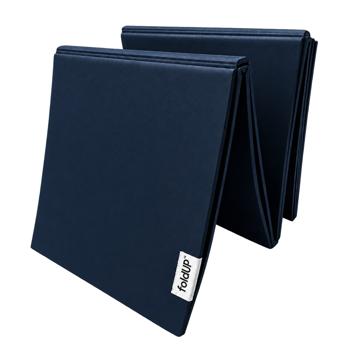 Navy foldUP Movement Mat standing partially folded, showing its rectangular panels and fabric logo label.